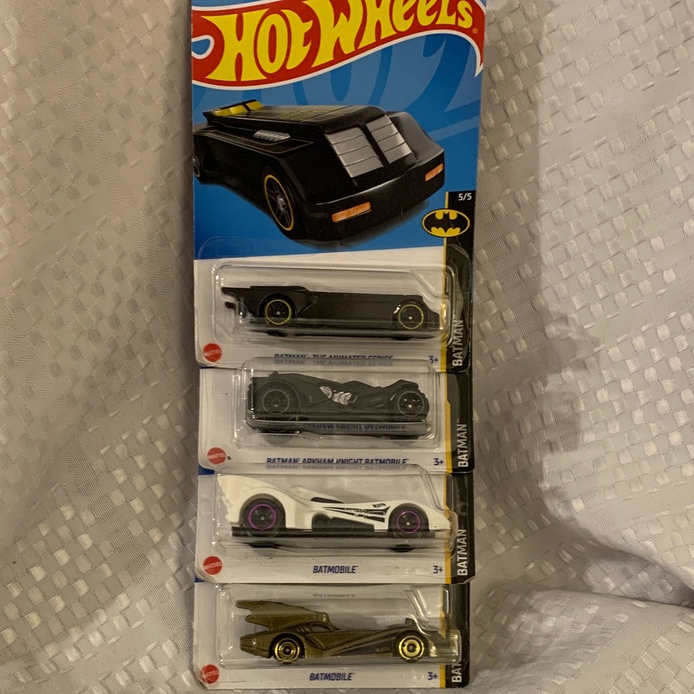 Hot wheels; Four different Batman Batmobile vehicles, new in packages.